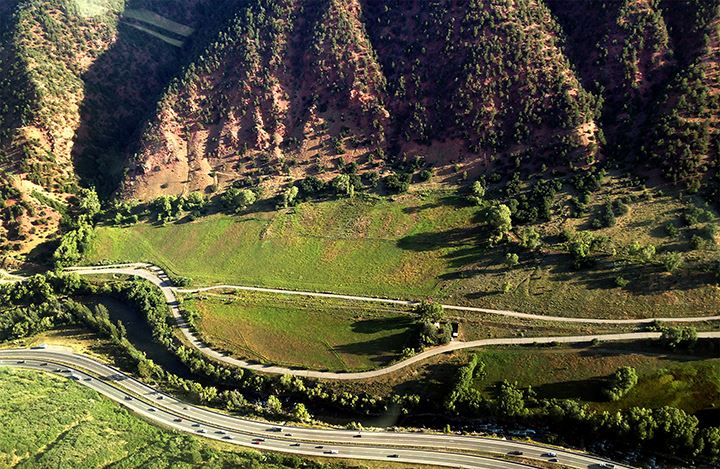 An aerial view of Wheatley Open Space, the Rio Grande Trail, Lower River Road and Highway 82