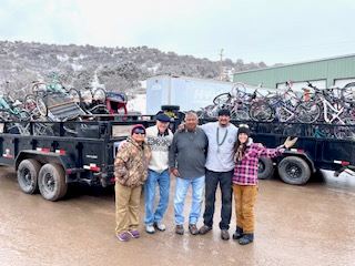 NavajoYes, Dine'Bike Project and Carbondale Bicycle Project members in front of the 126 bicycles