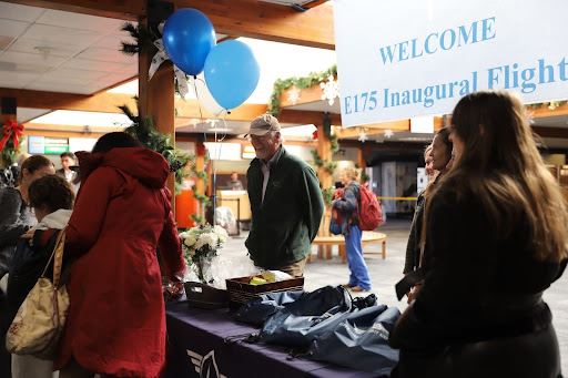 Pitkin County Commissioner Steve Child smiling while visiting a booth