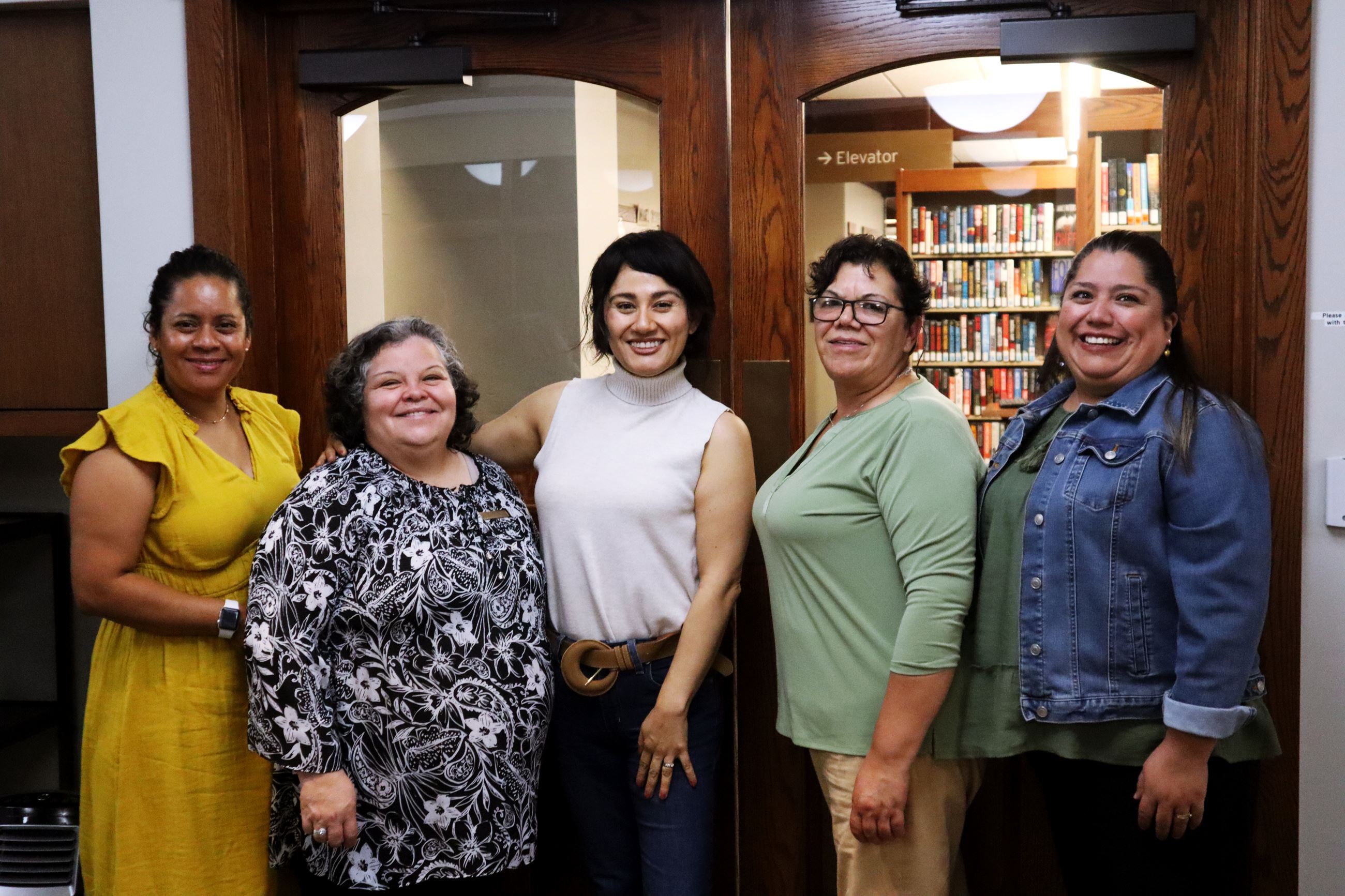 Pictured from left to right:  Alma - Savings Collaborative Ambassador Iliana Renteria in the middle-